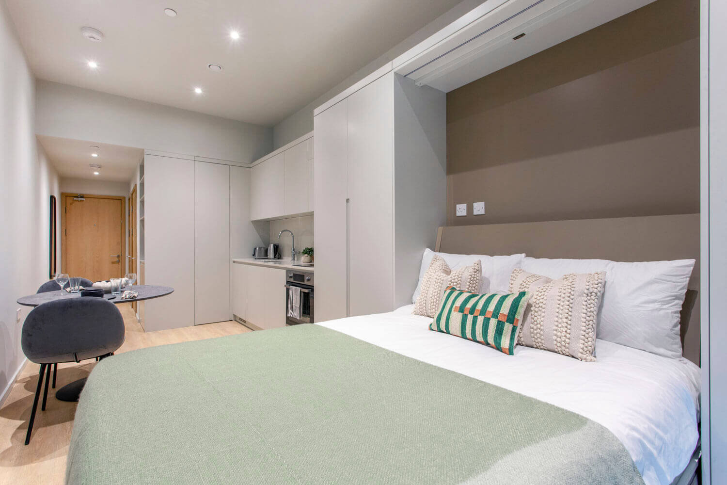 Bed with kitchen open plan